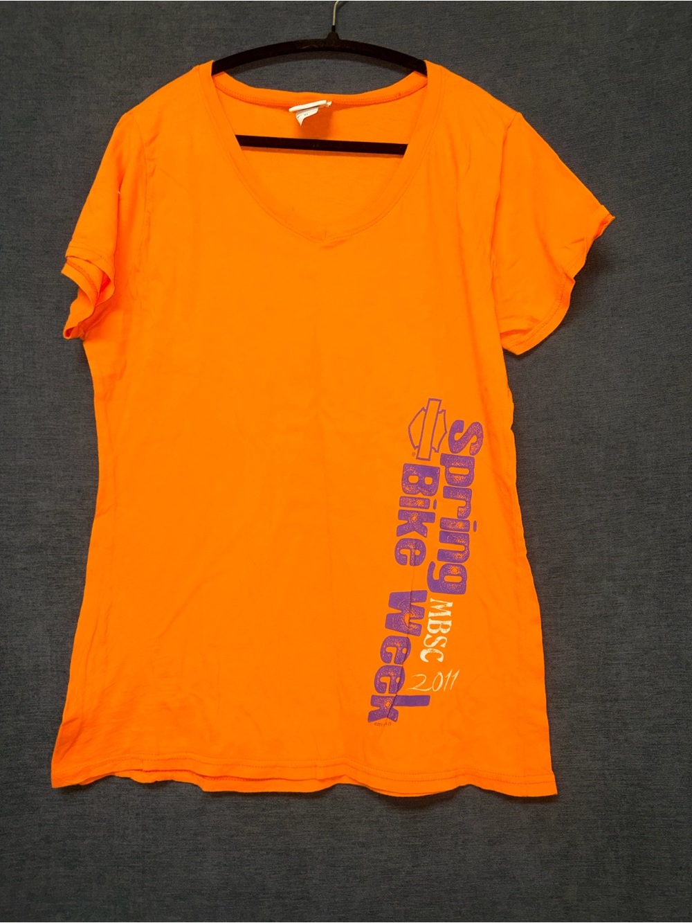 Harley-Davidson Orange V-Neck Tee with Purple Spring Bike Week Graphic